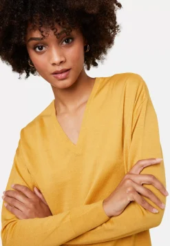 Maison Montagut Pulls>Pull Col V A Fentes En Laine Merinos - Aurora